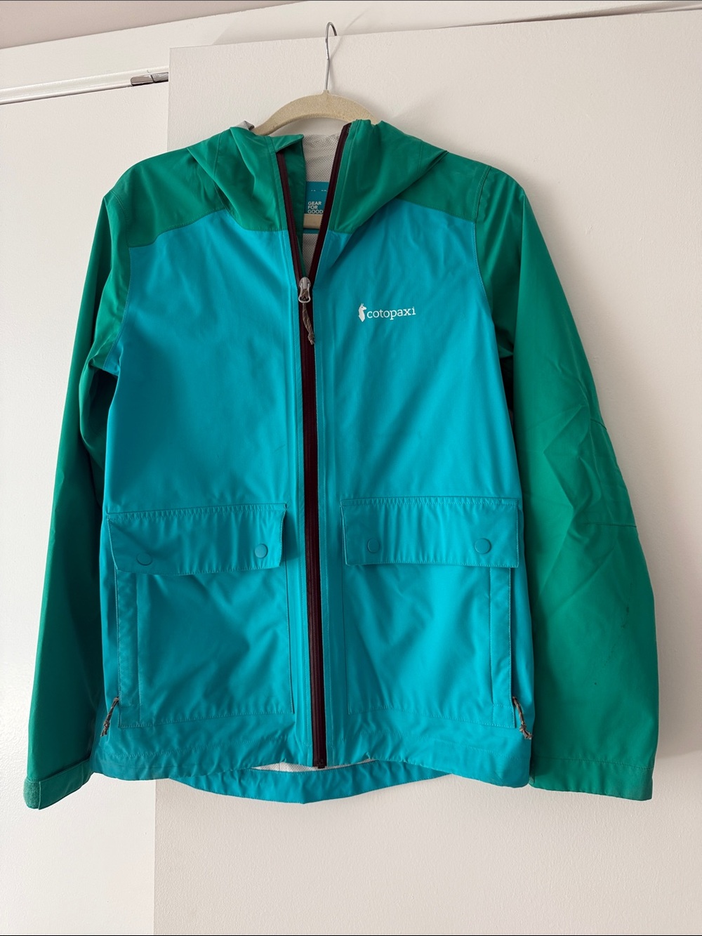 cotopaxi Teal and Green Hooded Rain Jacket